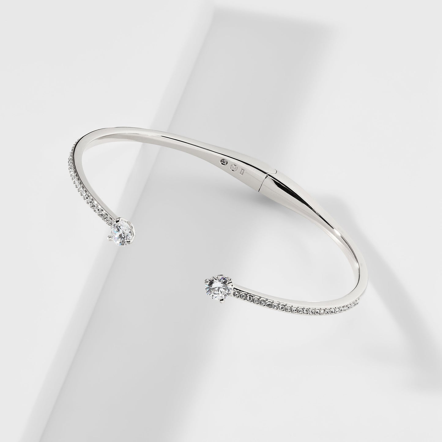 FLOATING CZ HINGED BRACELET