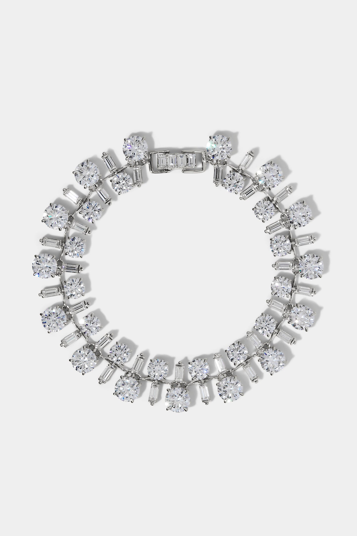 STELLAR CZ LINE BRACELET IN RHODIUM PLATING. 
