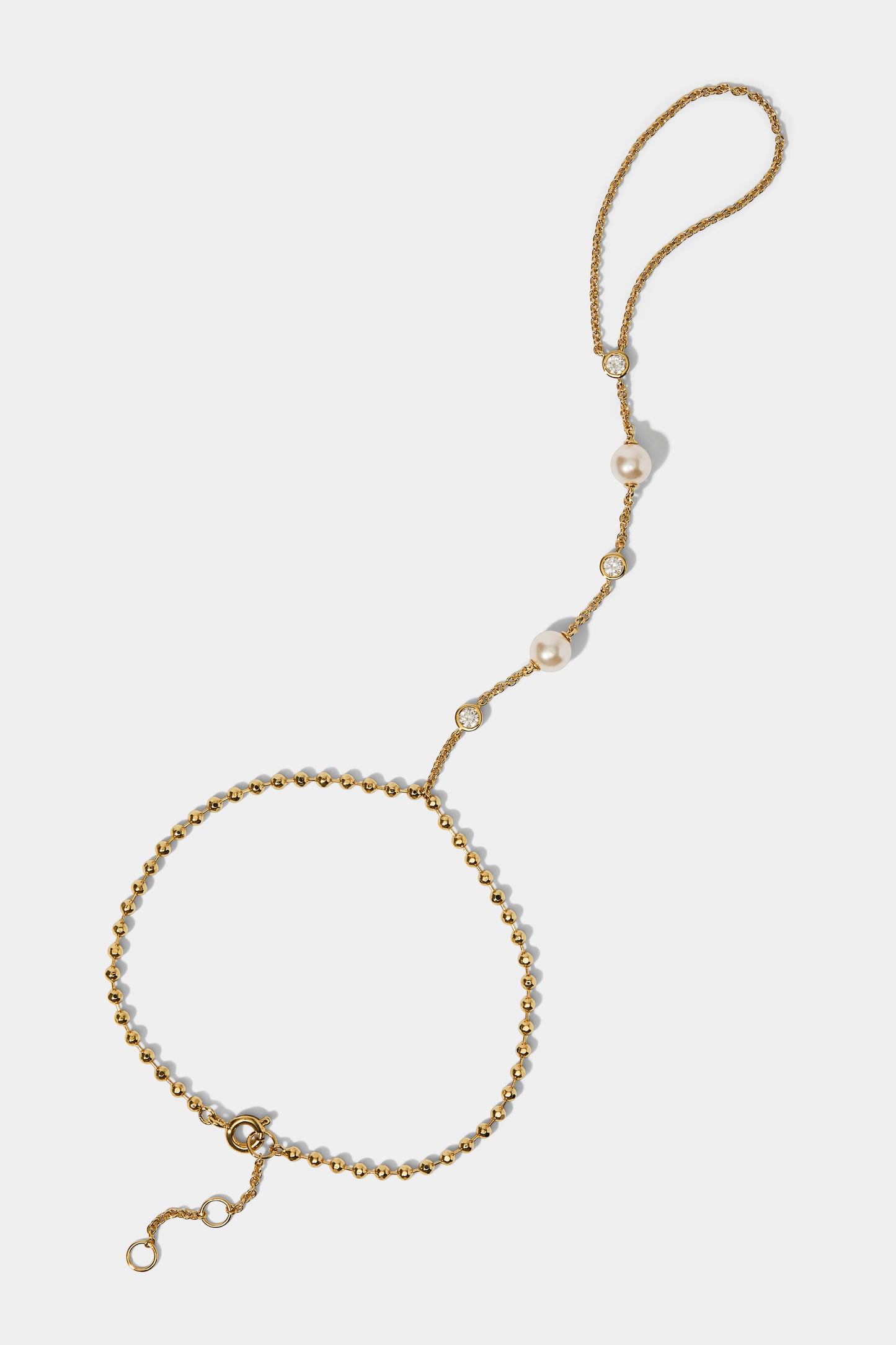 ESME PEARL HAND CHAIN BRACELET IN GOLD PLATING