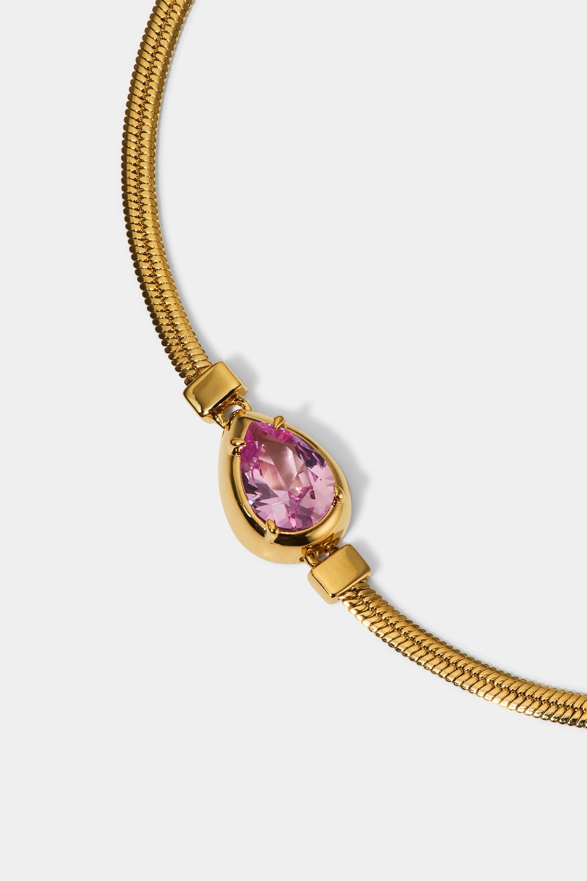 CLOSE UP OF THE PEAR STONE ON THE DELANCEY PINK PEAR LINE BRACELET