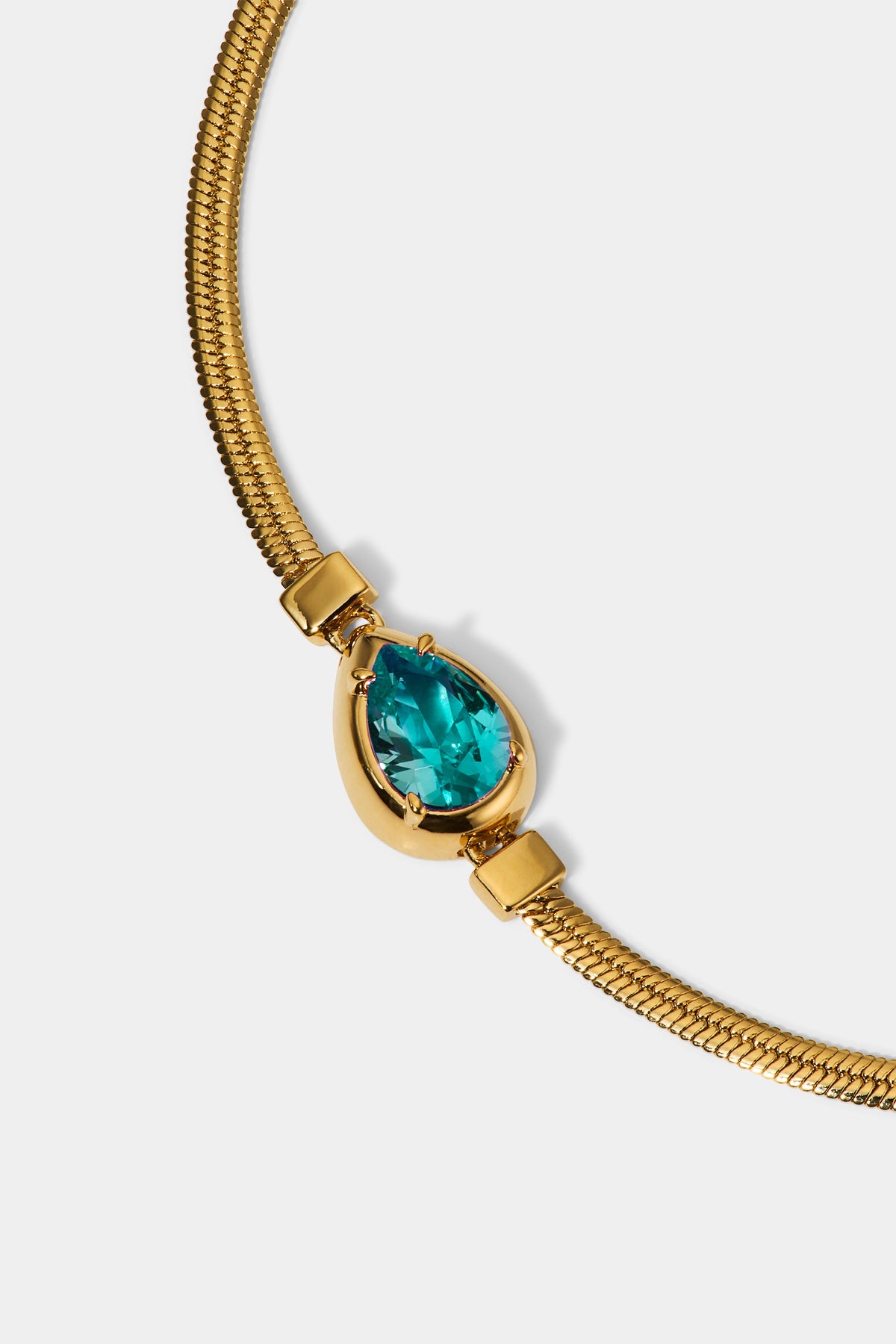 CLOSE UP OF THE PEAR STONE ON THE DELANCEY AQUA PEAR LINE BRACELET