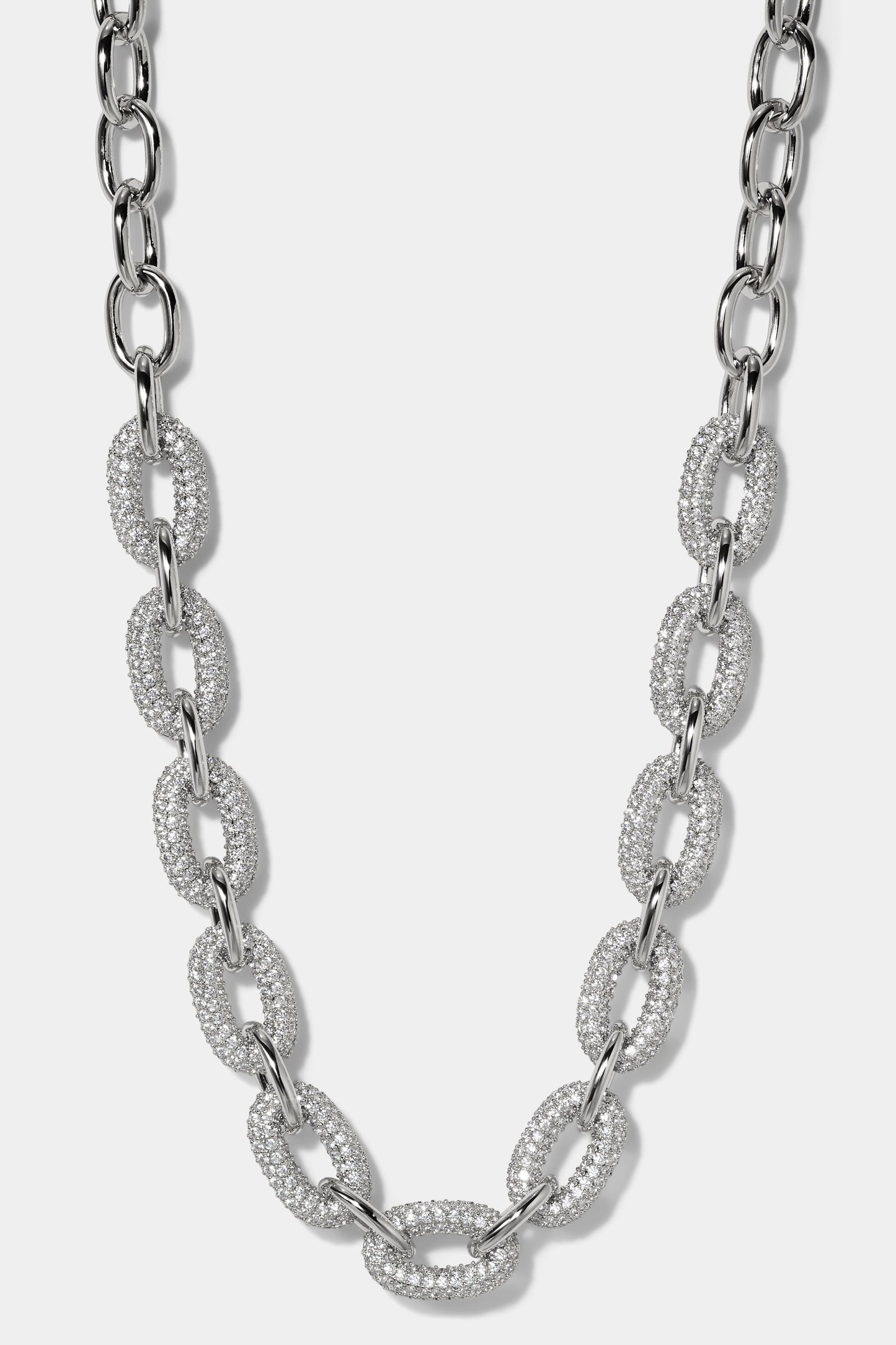 ALMA DRAMA PAVE LINK NECKLACE IN RHODIUM PLATING.
