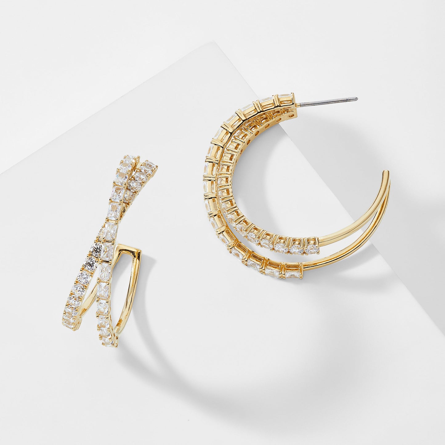 EMERALD ISLE CROSSED CZ HOOP EARRINGS