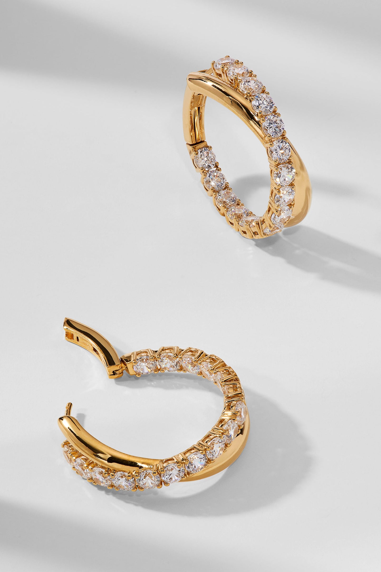 TWILIGHT CROSSOVER HOOP EARRINGS
