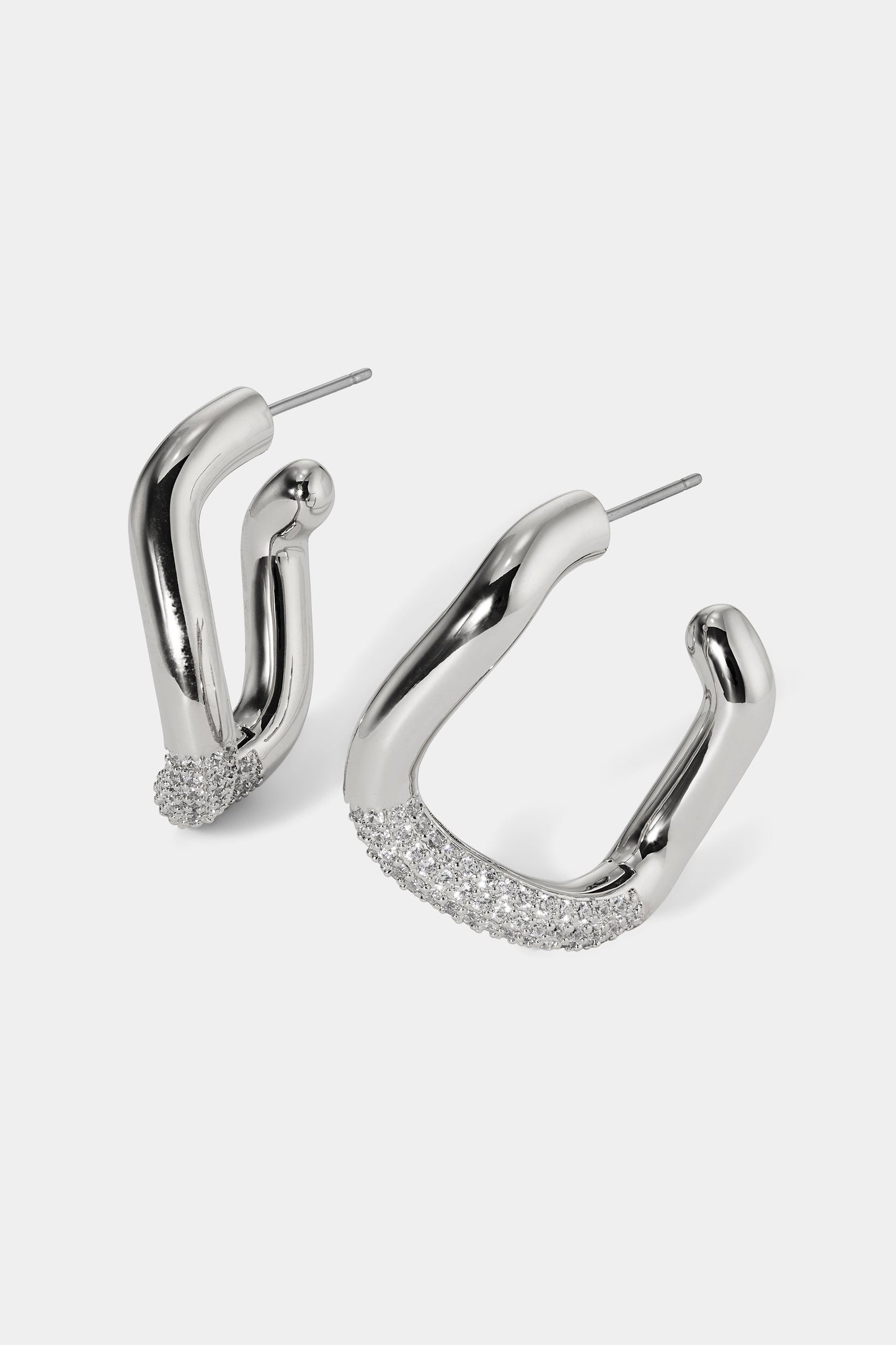 ALMA PAVE ORGANIC C HOOP EARRINGS IN RHODIUM PLATING