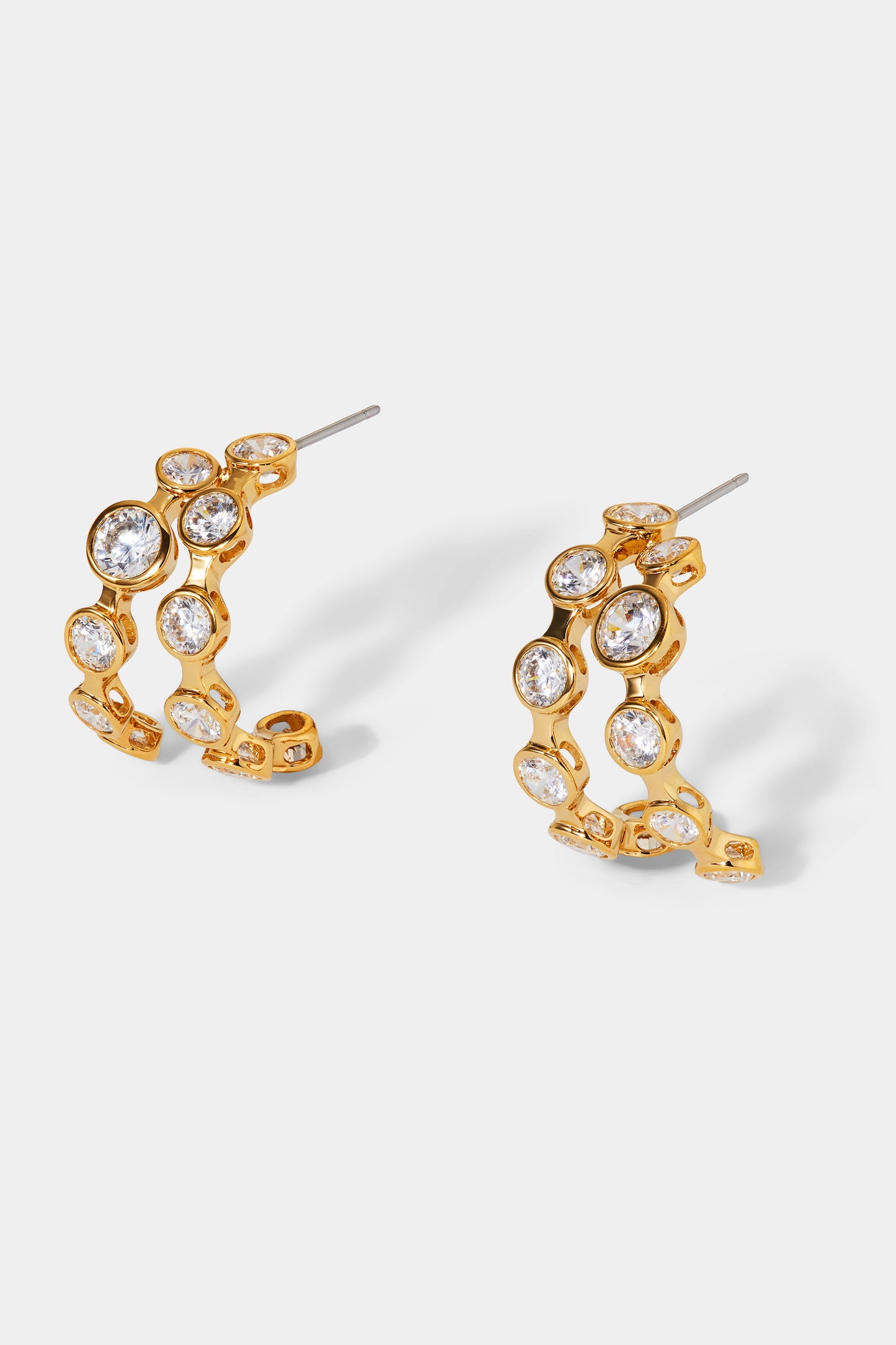 SIDE VIEW OF BROOKLYN DOUBLE ROW C HOOP EARRINGS IN GOLD PLATING
