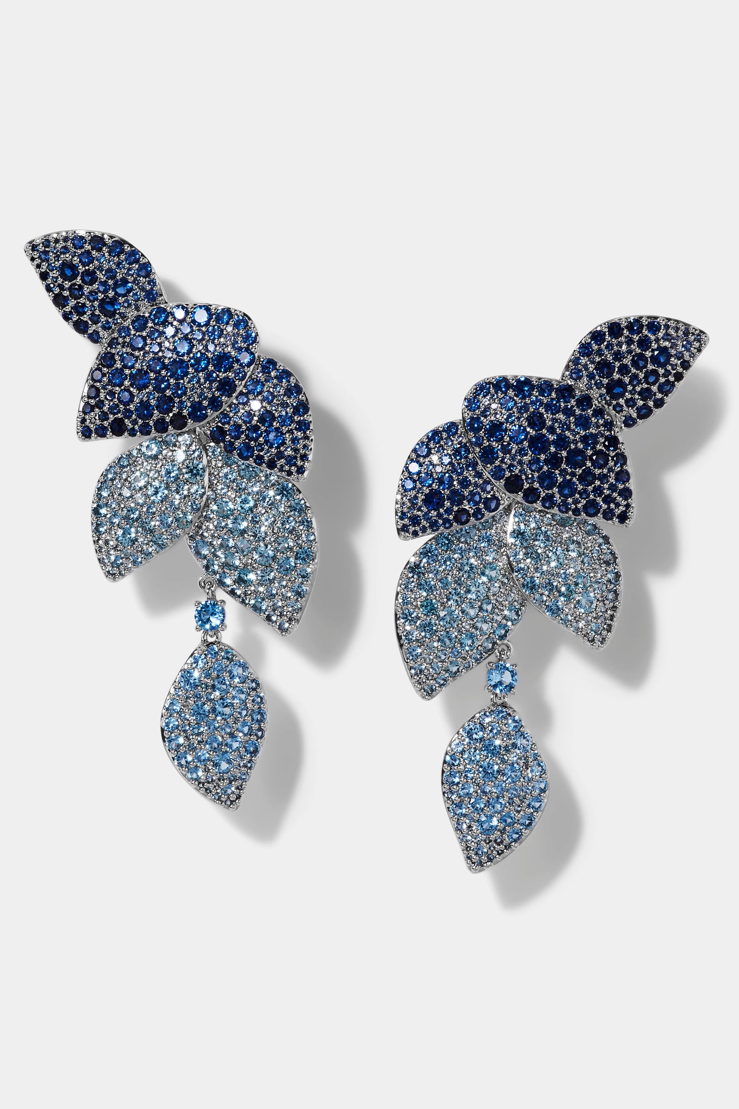 STARLET BLUE LEAF LINEAR EARRINGS IN RHODIUM PLATING