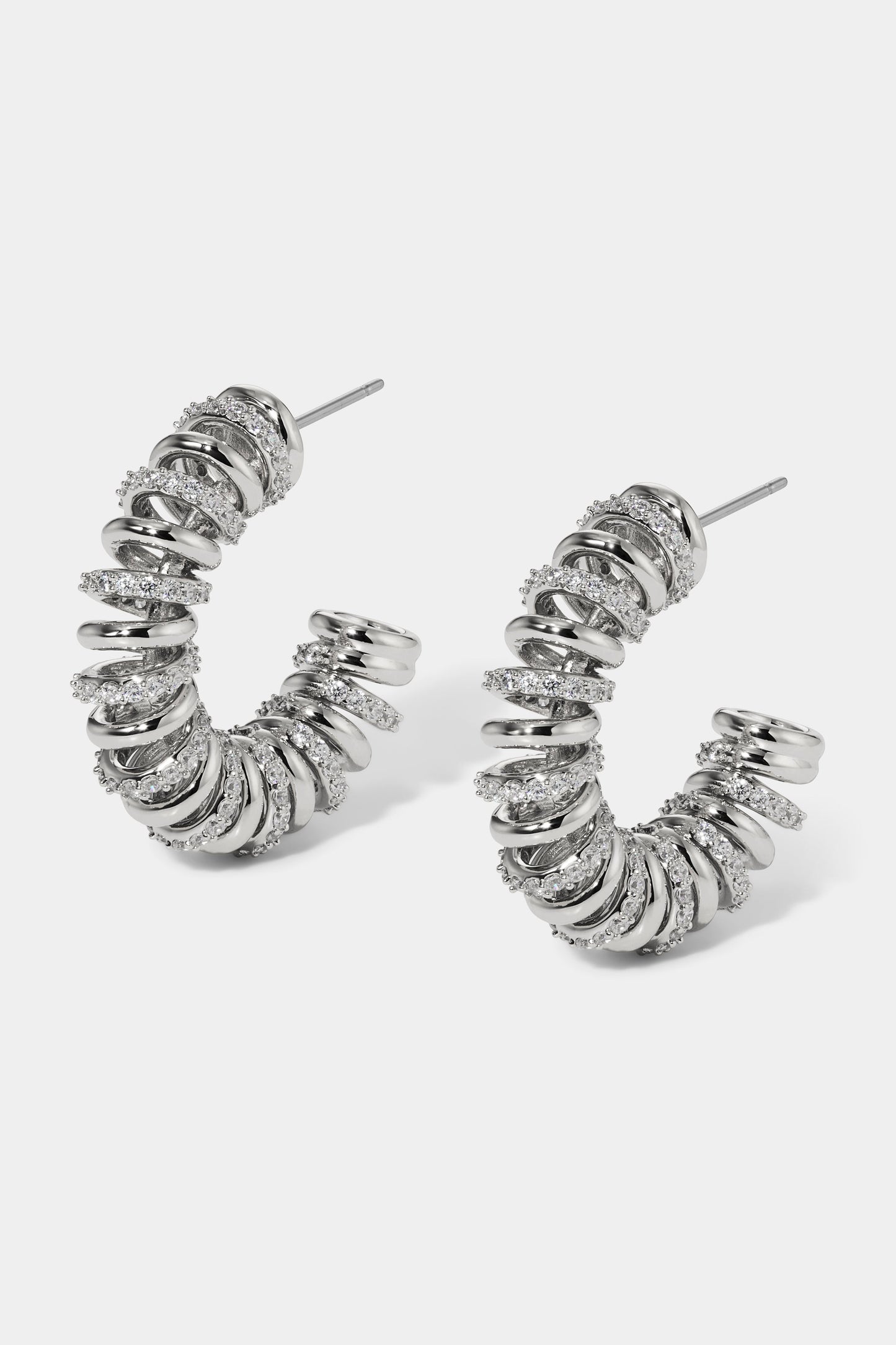 PISA COIL C HOOP EARRINGS IN RHODIUM PLATING