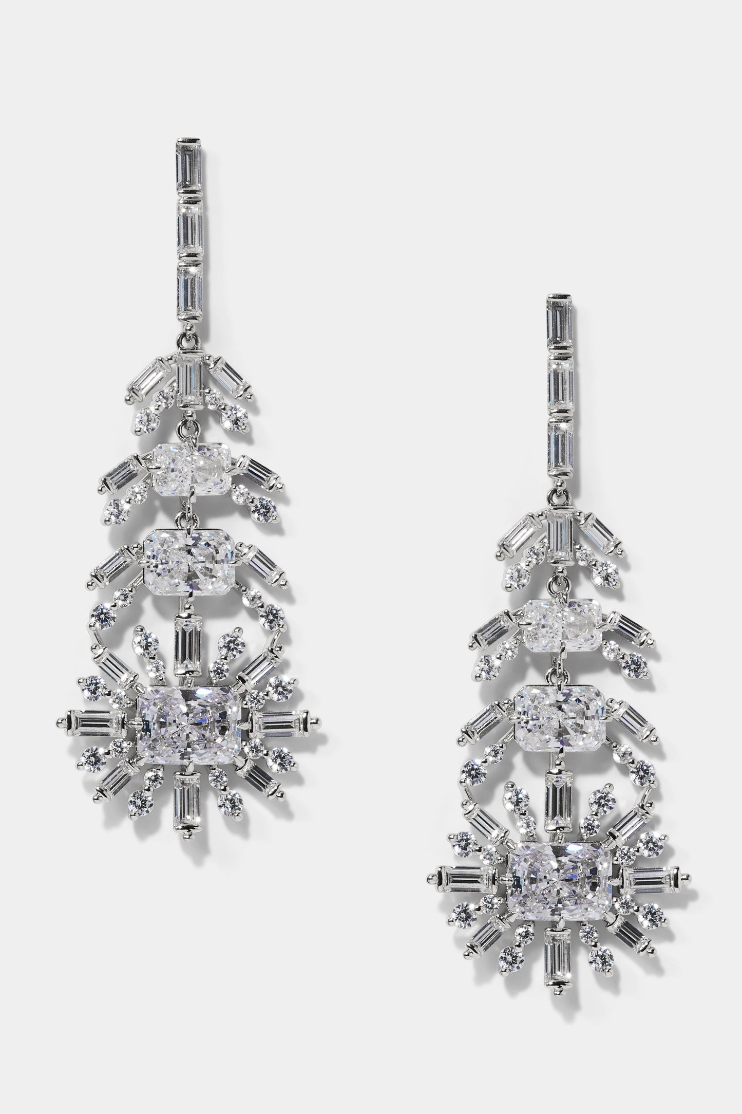 STELLAR FEATHER DROP EARRINGS IN RHODIUM