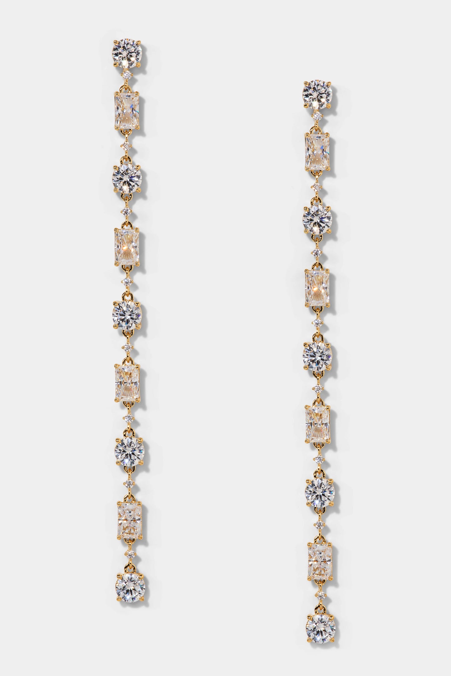EVERLEIGH LONG LINEAR EARRINGS IN GOLD PLATING.