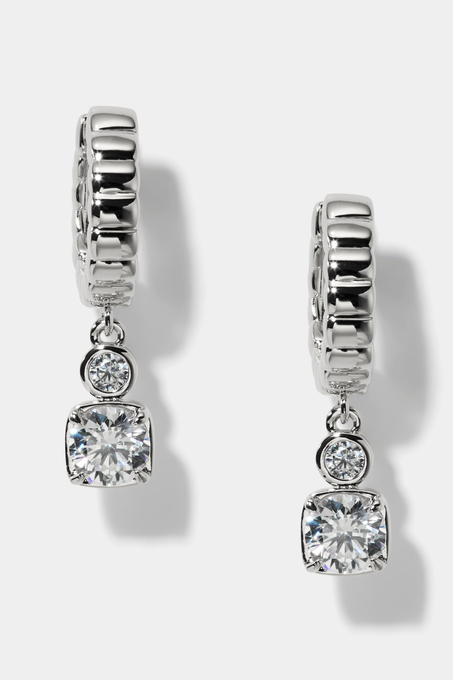 DELANCEY SMALL CHARM HOOP EARRINGS IN RHODIUM PLATING