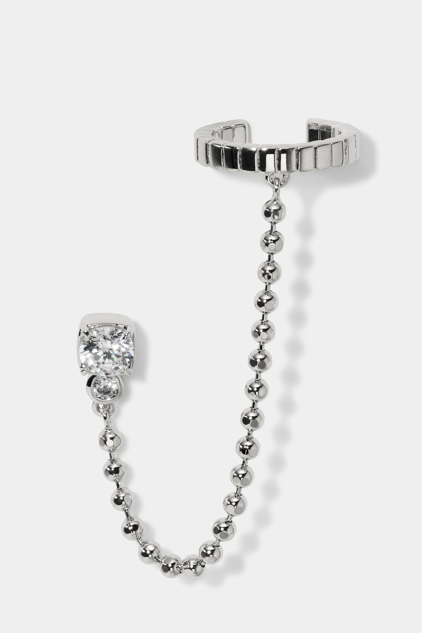 DELANCEY SINGLE SWAG CUFF EARRINGS IN RHODIUM PLATING