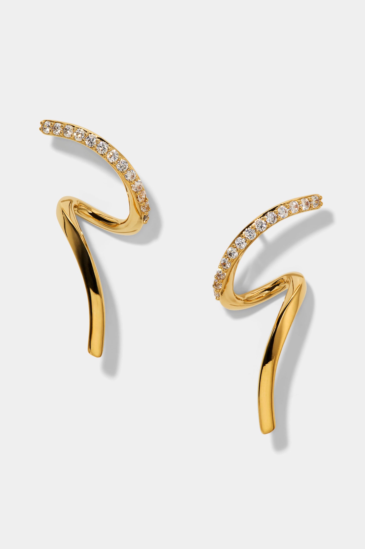 MUSE TWIRL STUD EARRINGS IN GOLD PLATING