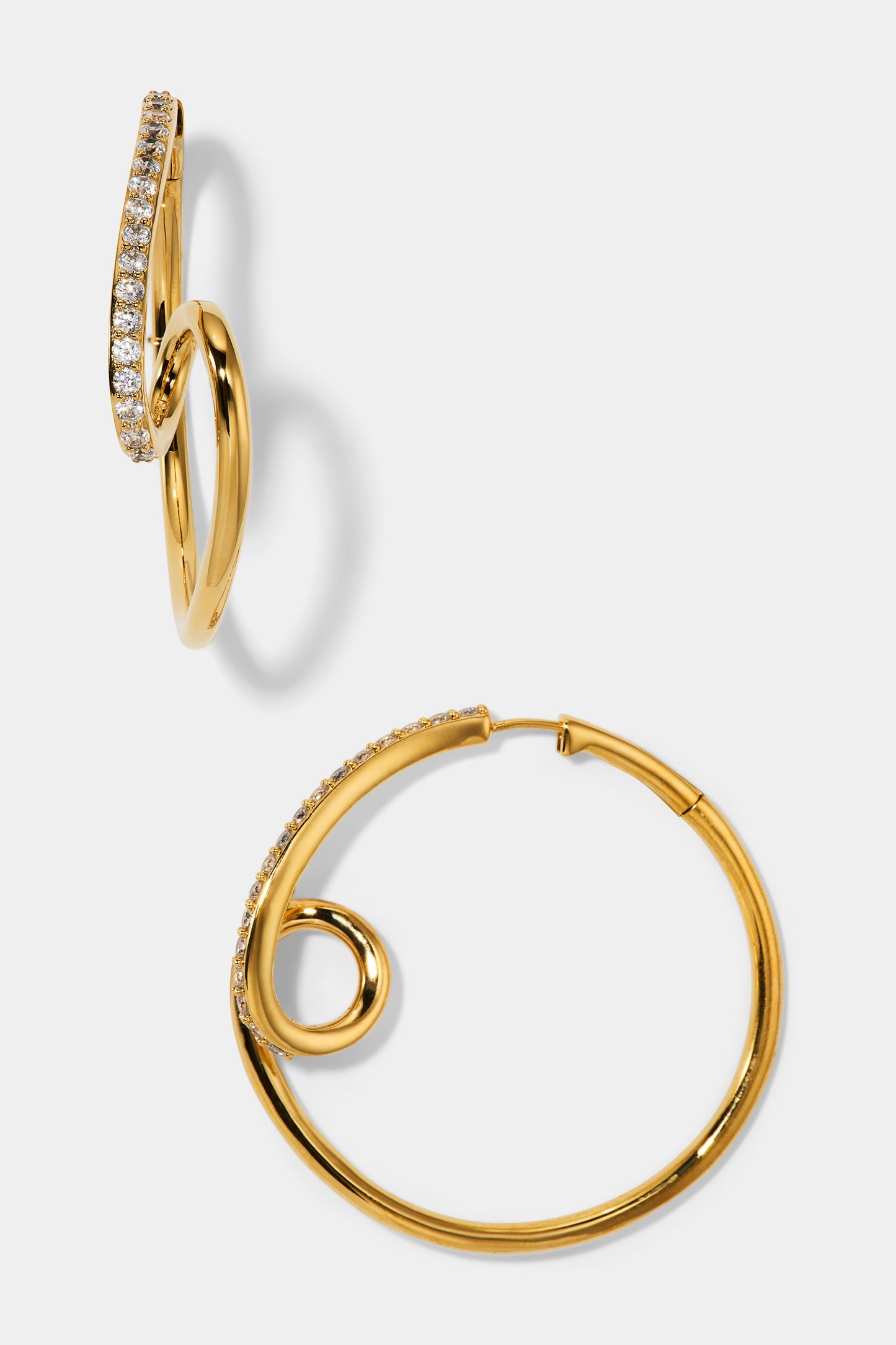 MUSE SWIRL HOOP EARRINGS IN GOLD PLATING