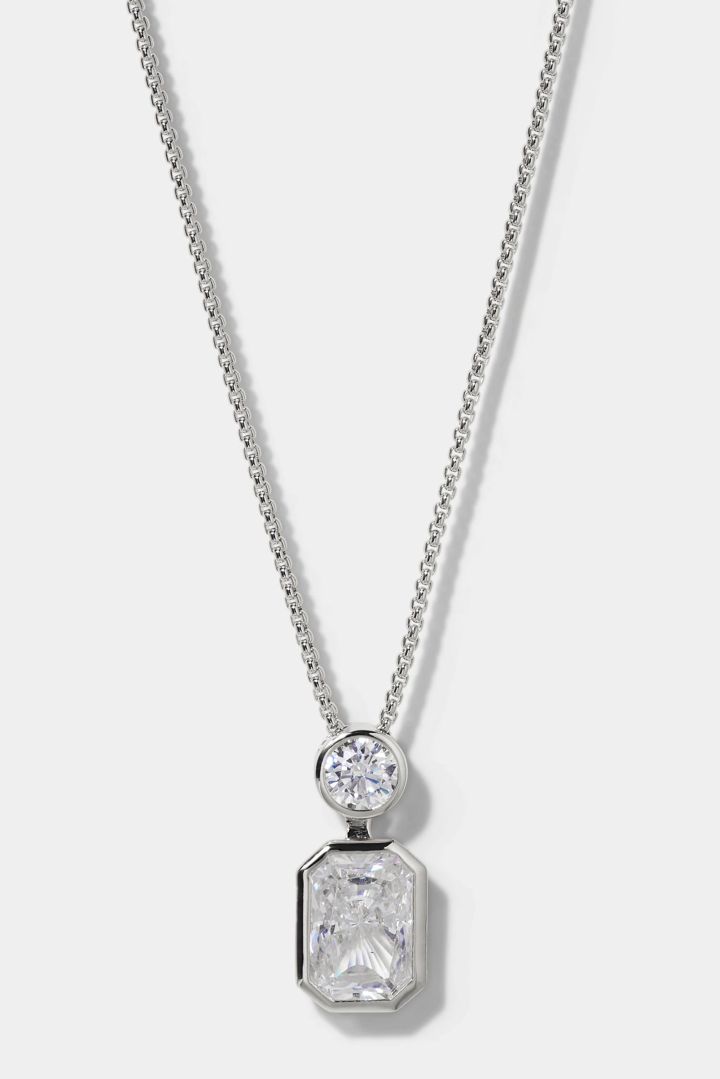 BROOKLYN SLIDE EMERALD CZ PENDANT IN RHODIUM PLATING