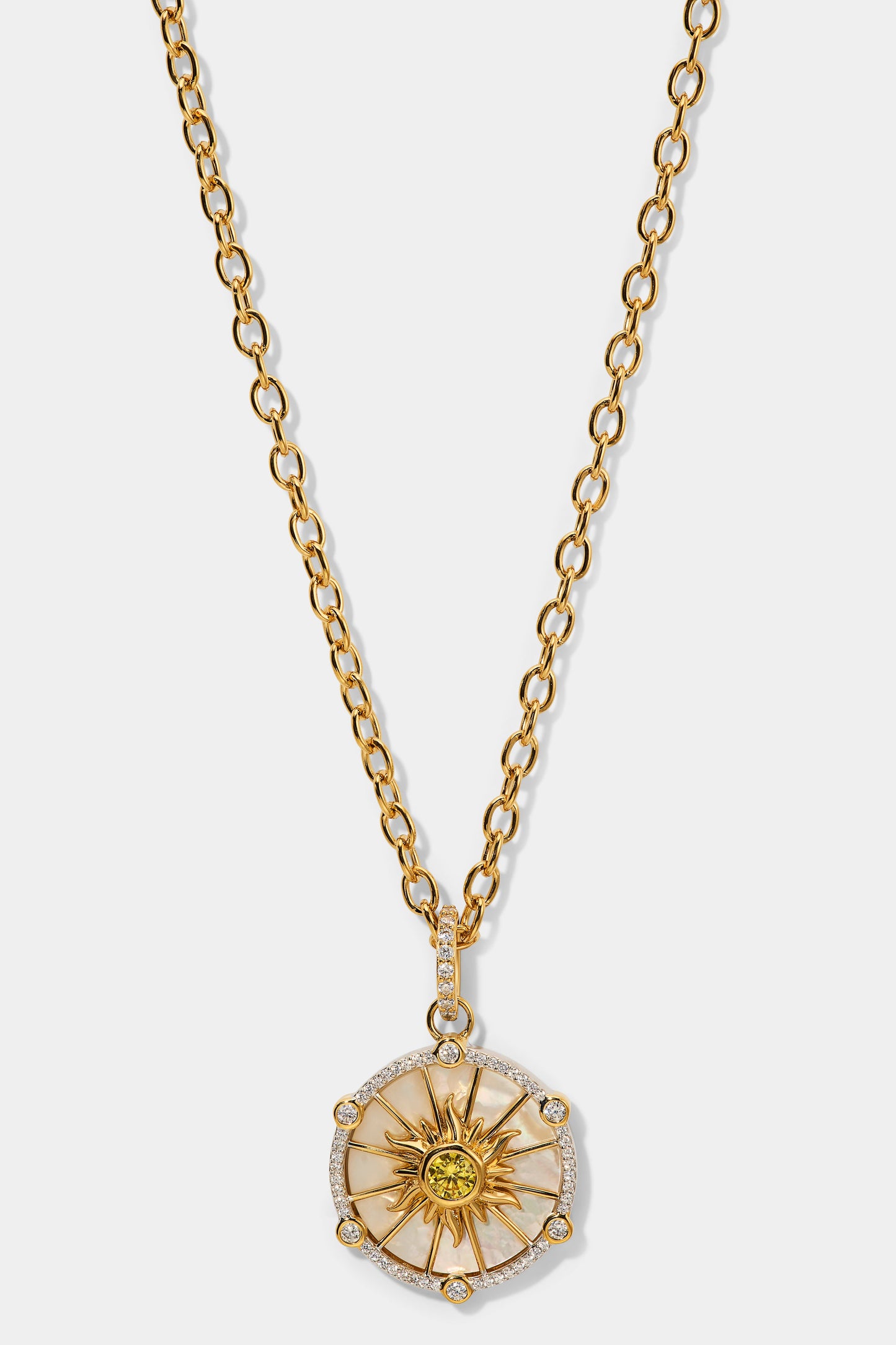 NADRI’S GLOBE TROTTER SUN PENDANT NECKLACE