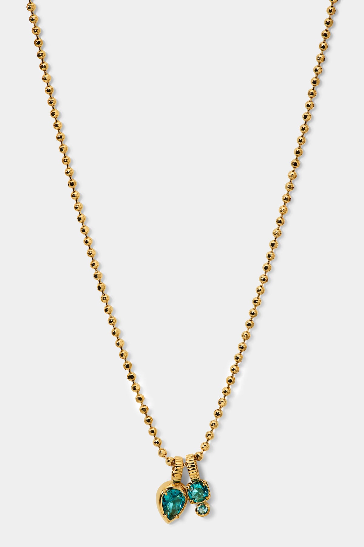 DELANCEY AQUA CHARM PENDANT NECKLACE IN GOLD PLATING