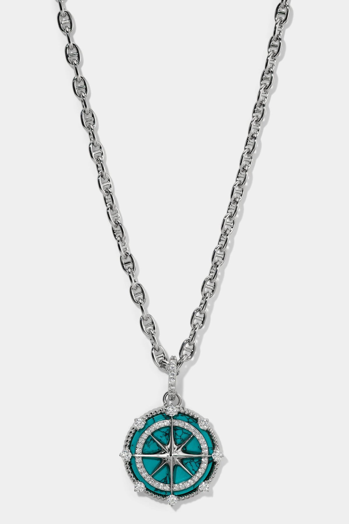 NADRI’S GLOBE TROTTER TURQUOISE COMPASS PENDANT NECKLACE IN RHODIUM PLATING