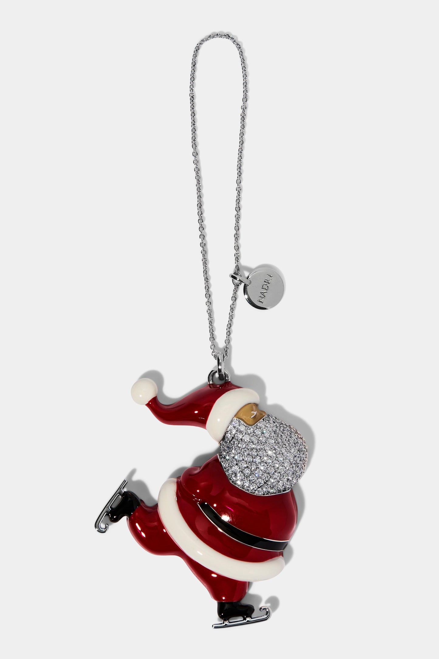 GOOD CHEER SKATING SANTA ORNAMENT IN RHODIUM