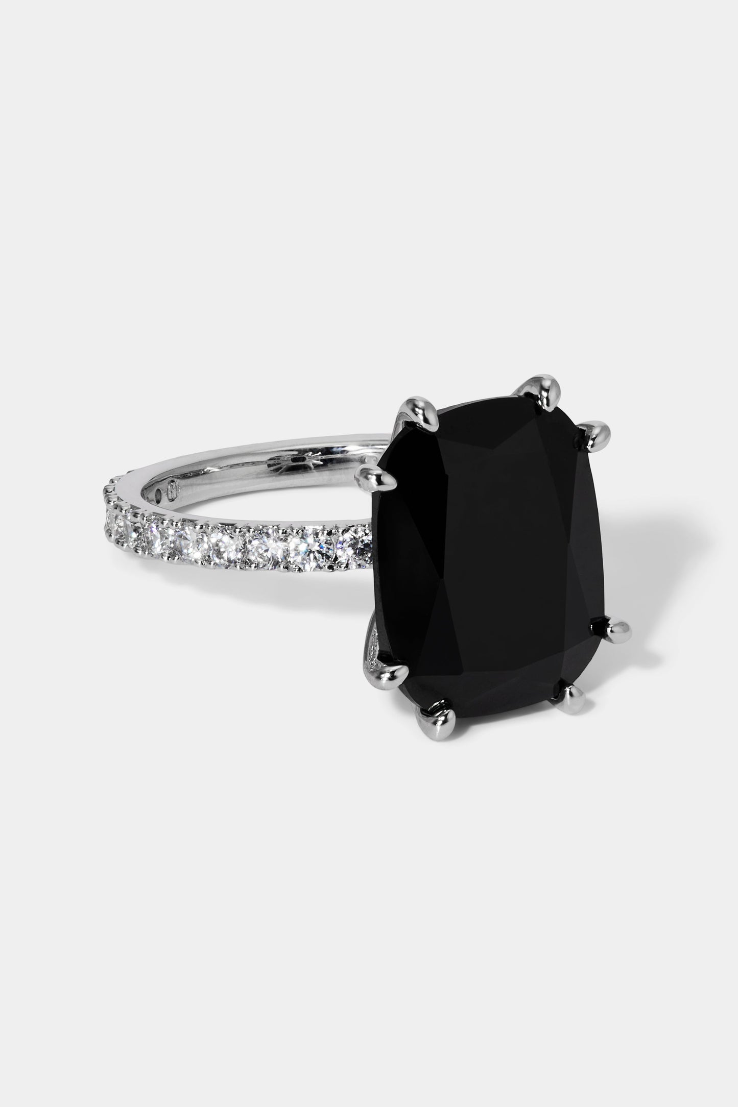 SIDE VIEW OF STARLET BOLD BLACK CUSHION RING IN RHODIUM PLATING