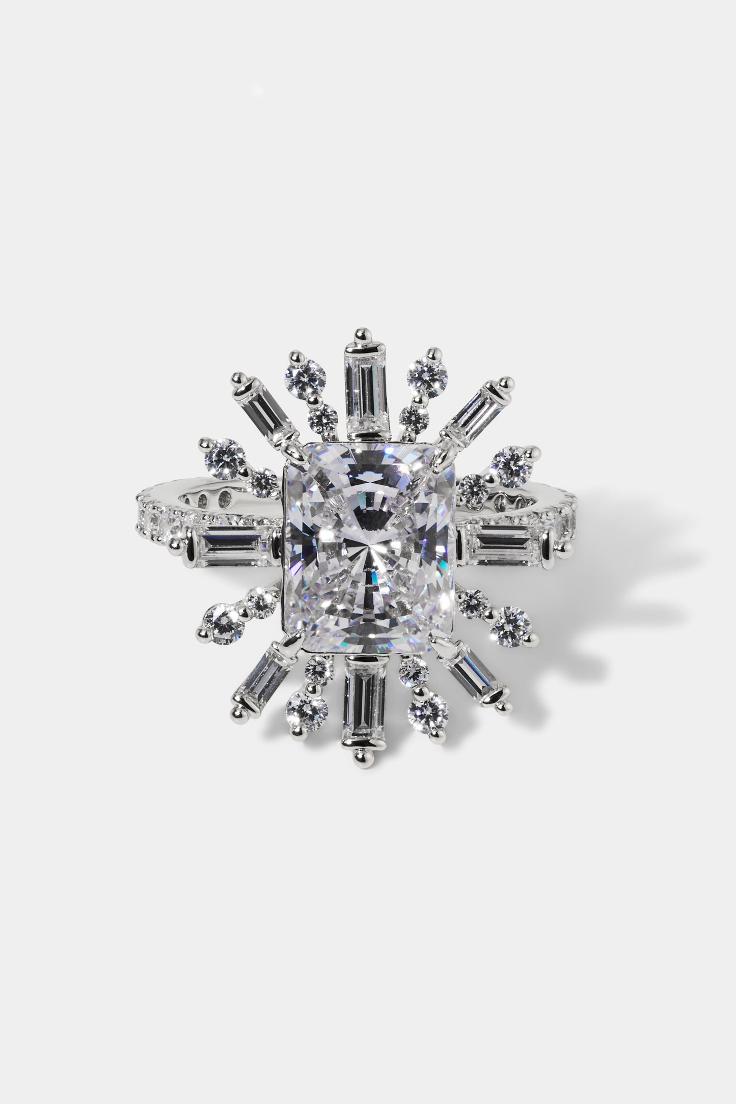 STELLAR CZ HALO RING IN RHODIUM PLATING