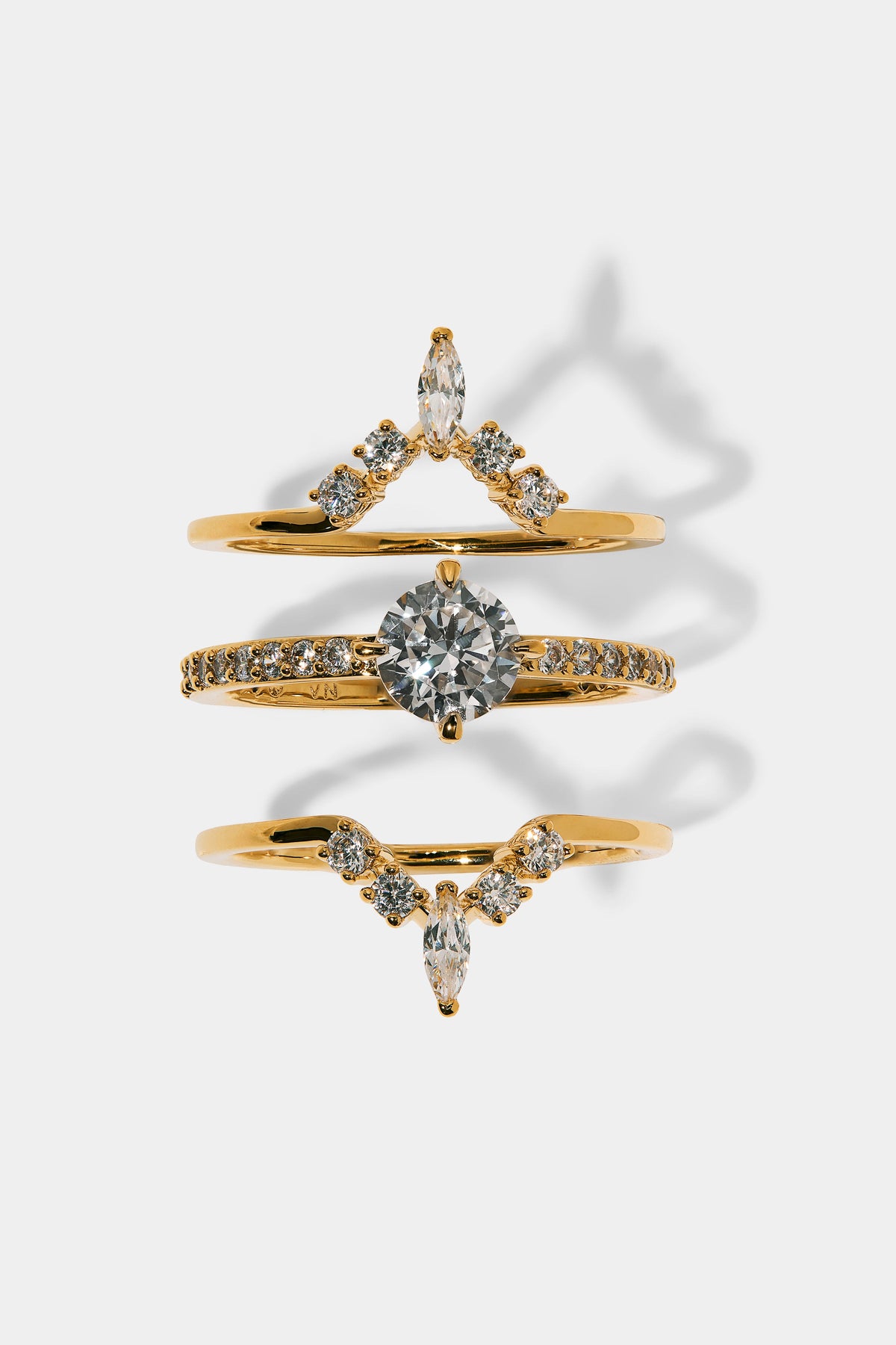 CANNES SMALL STACK RING IN GOLD PLATING, EACH RING SEPARATED TO SHOW THE FULL STACK INCLUDED