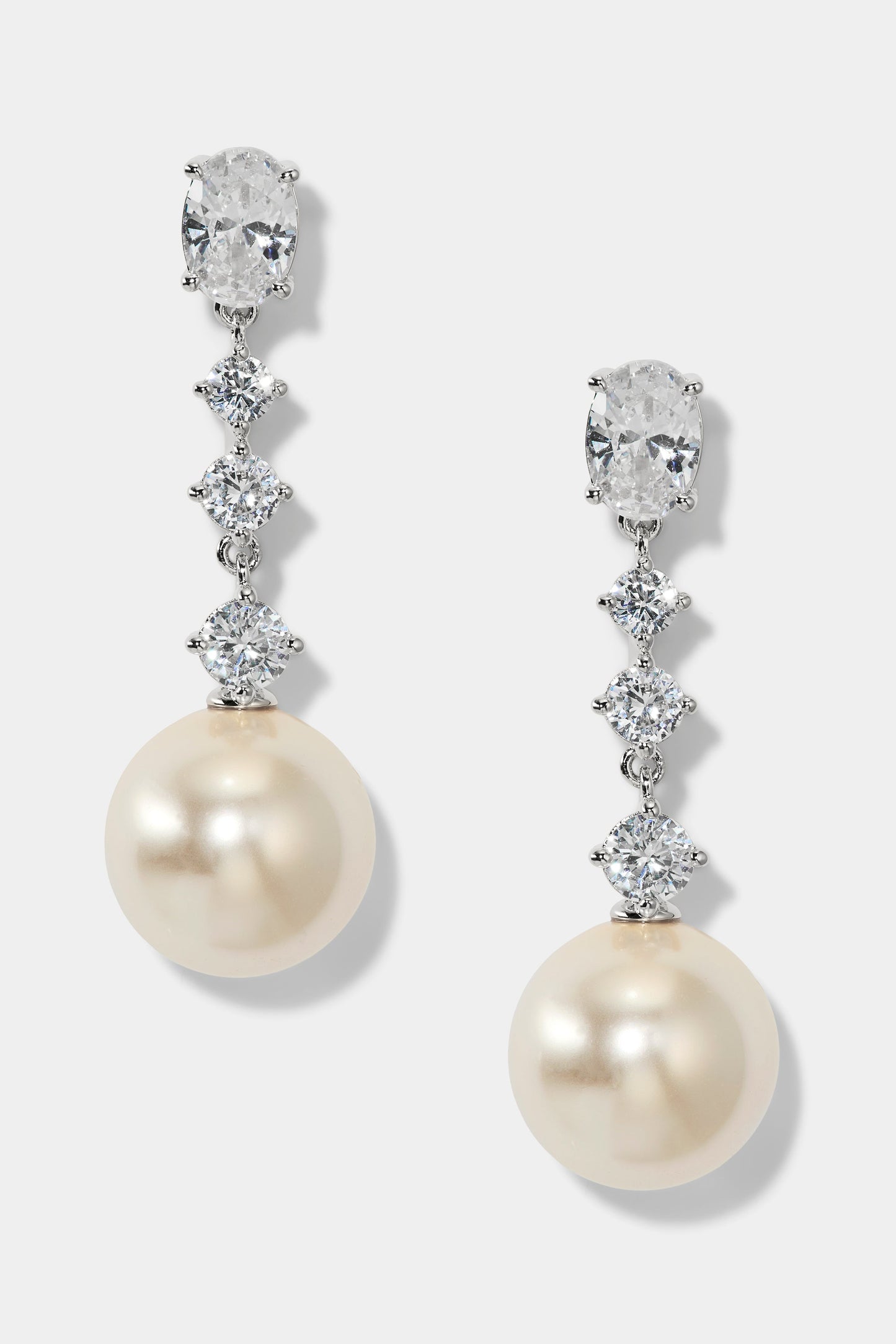 UNDER THE SEA PEARL LINEAR EARRINGS IN RHODIUM PLATING