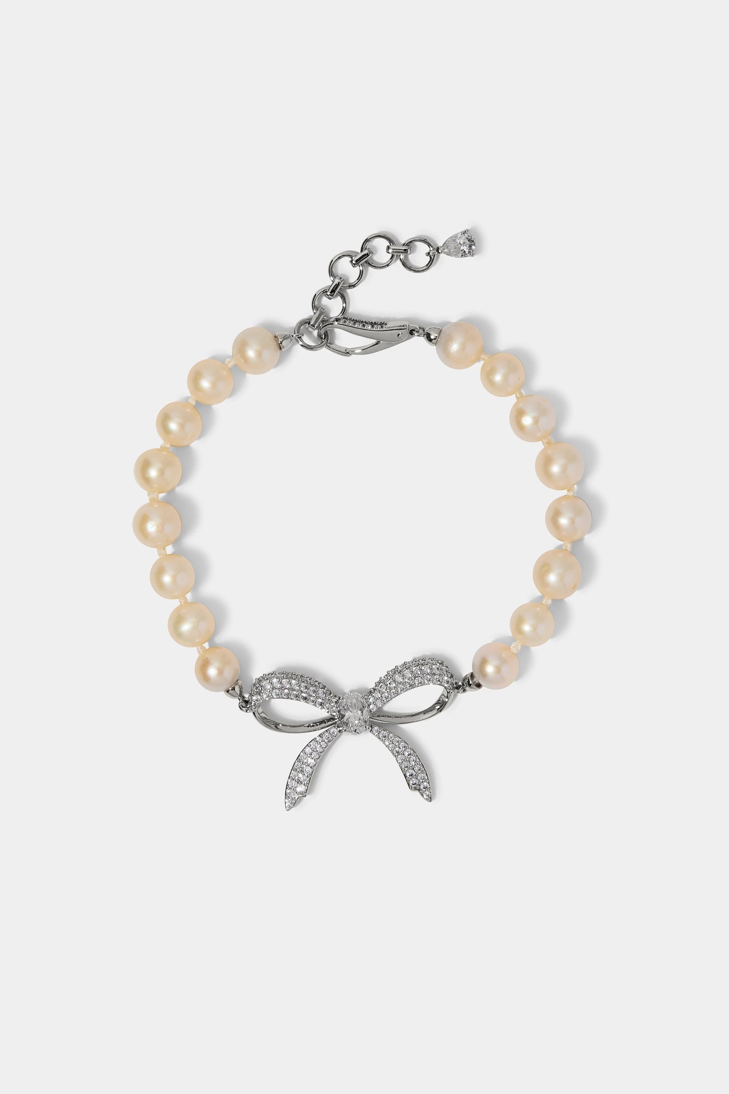 EROS BOW AND PEARL LINE BRACELET IN RHODIUM PLATING