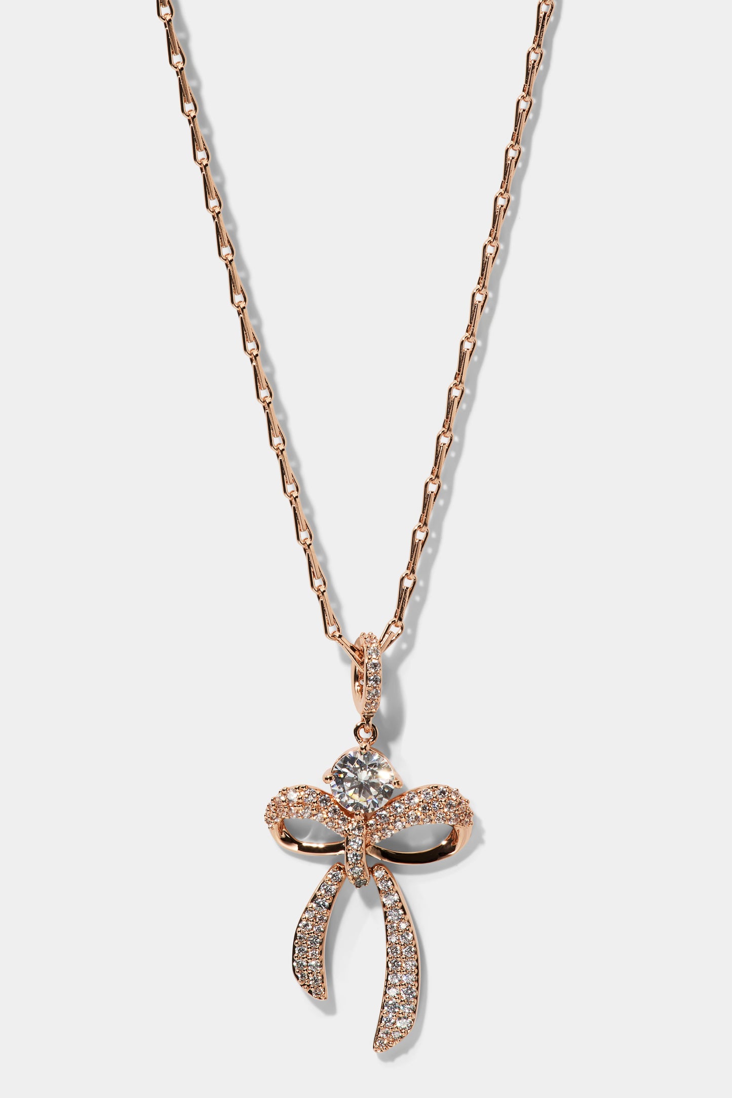 EROS BOW AND CZ PENDANT NECKLACE