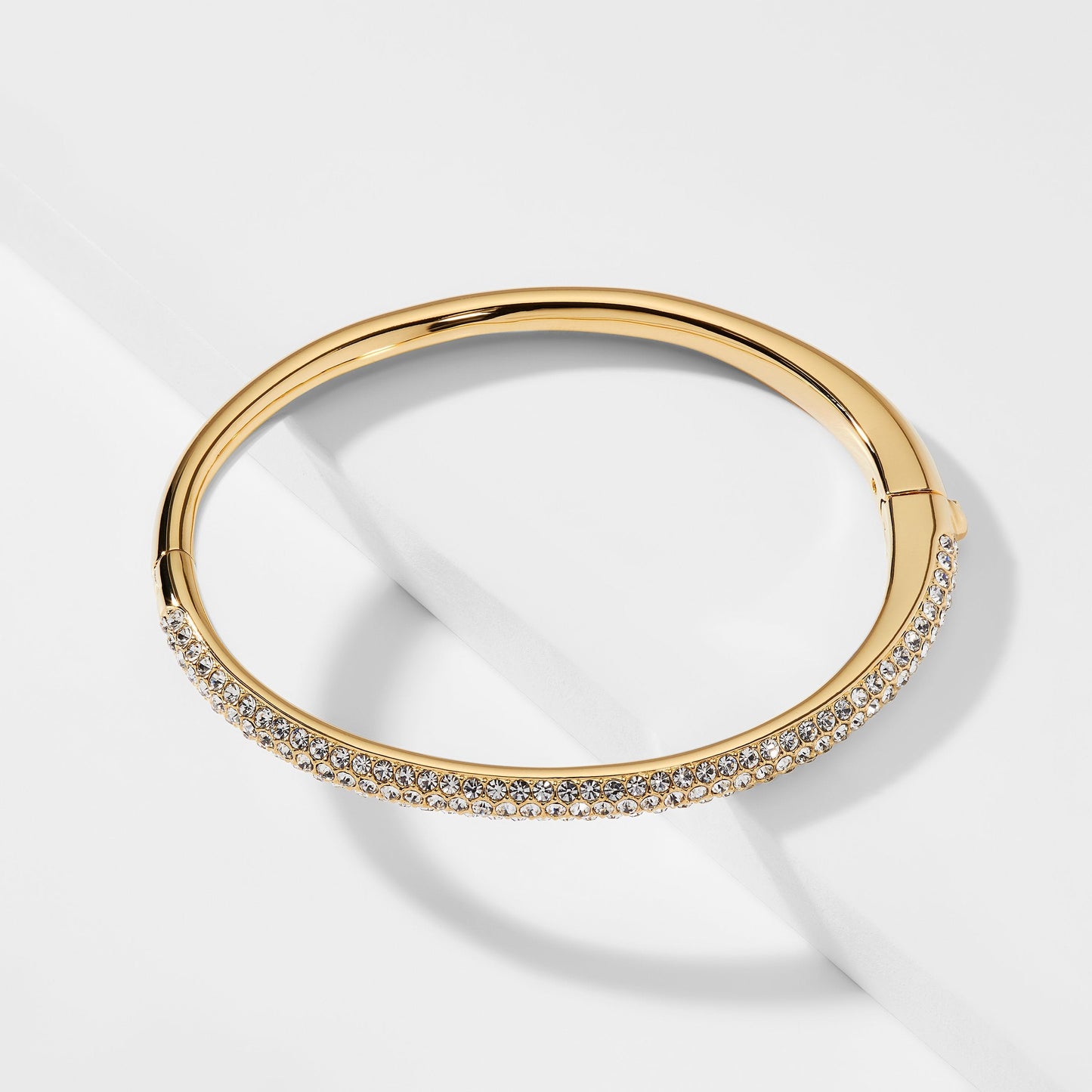 HALF PAVE CZ HINGED OVAL BANGLE