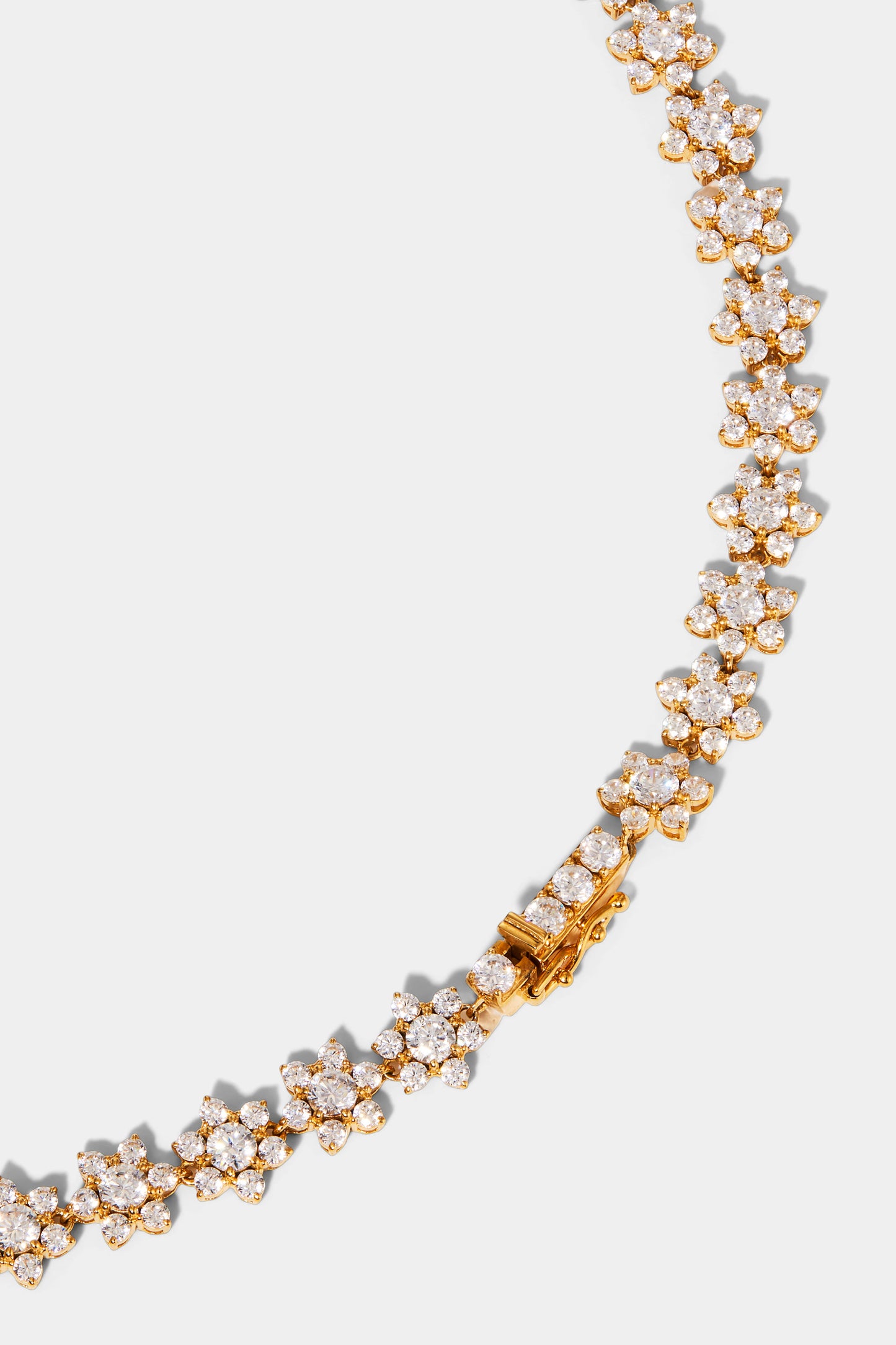CLOSE UP DETAIL IMAGE OF DAHLIA FLORAL COLLAR NECKLACE IN GOLD PLATING