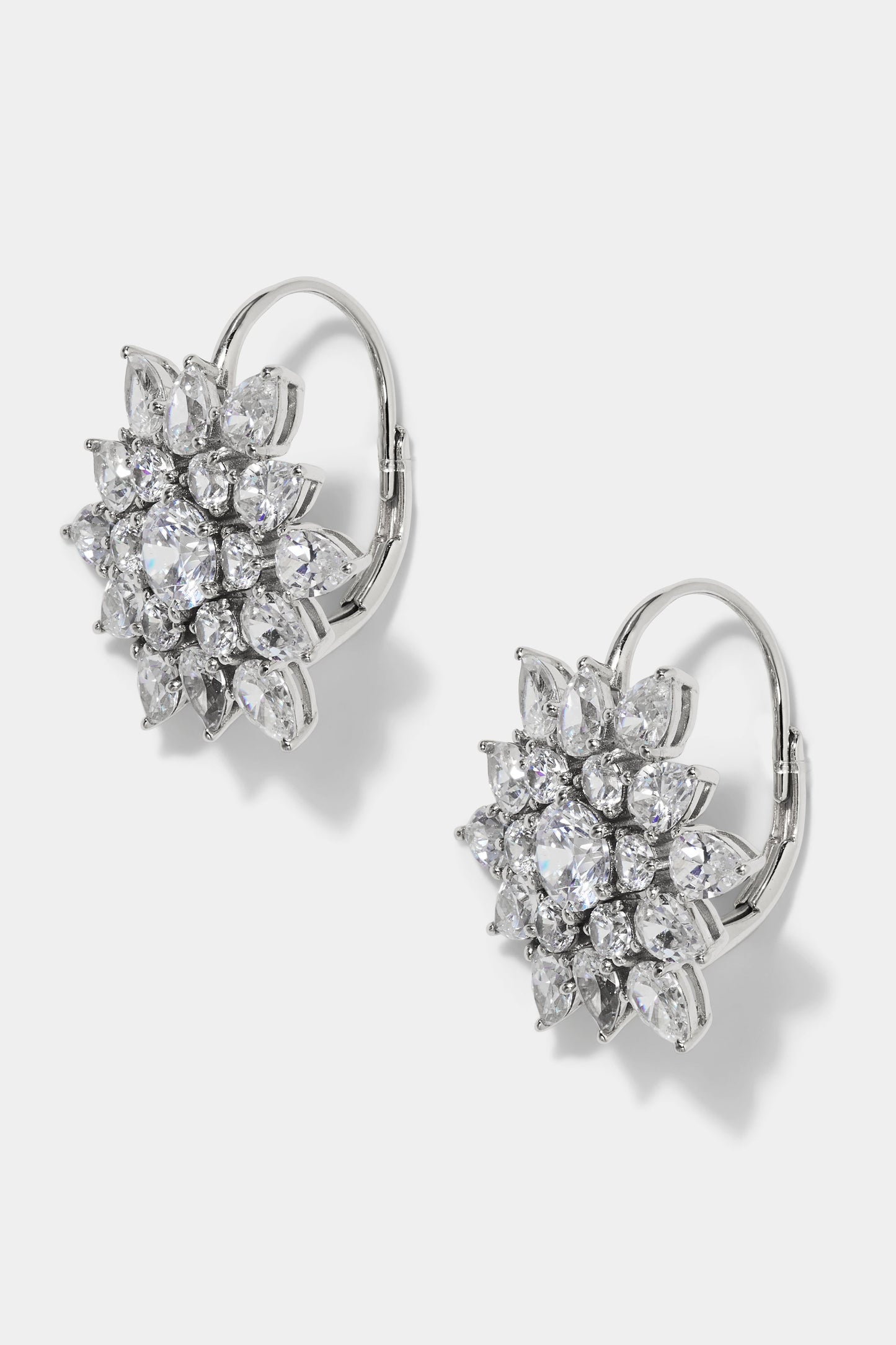 DAHLIA CLUSTER LEVERBACK EARRINGS IN RHODIUM PLATING FROM THE SIDE VIEW. 