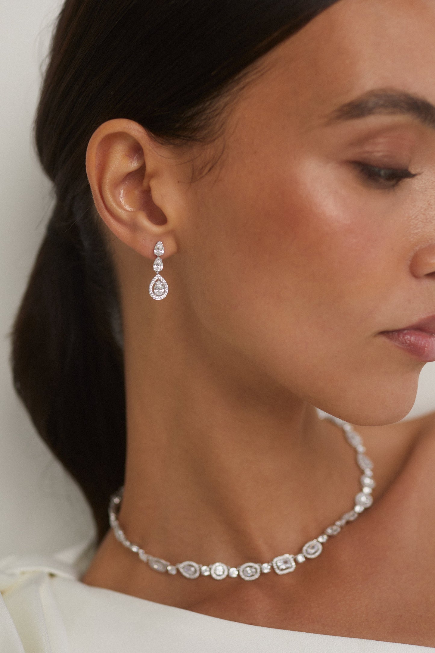 RADIANT PEAR CZ DROP POST EARRINGS