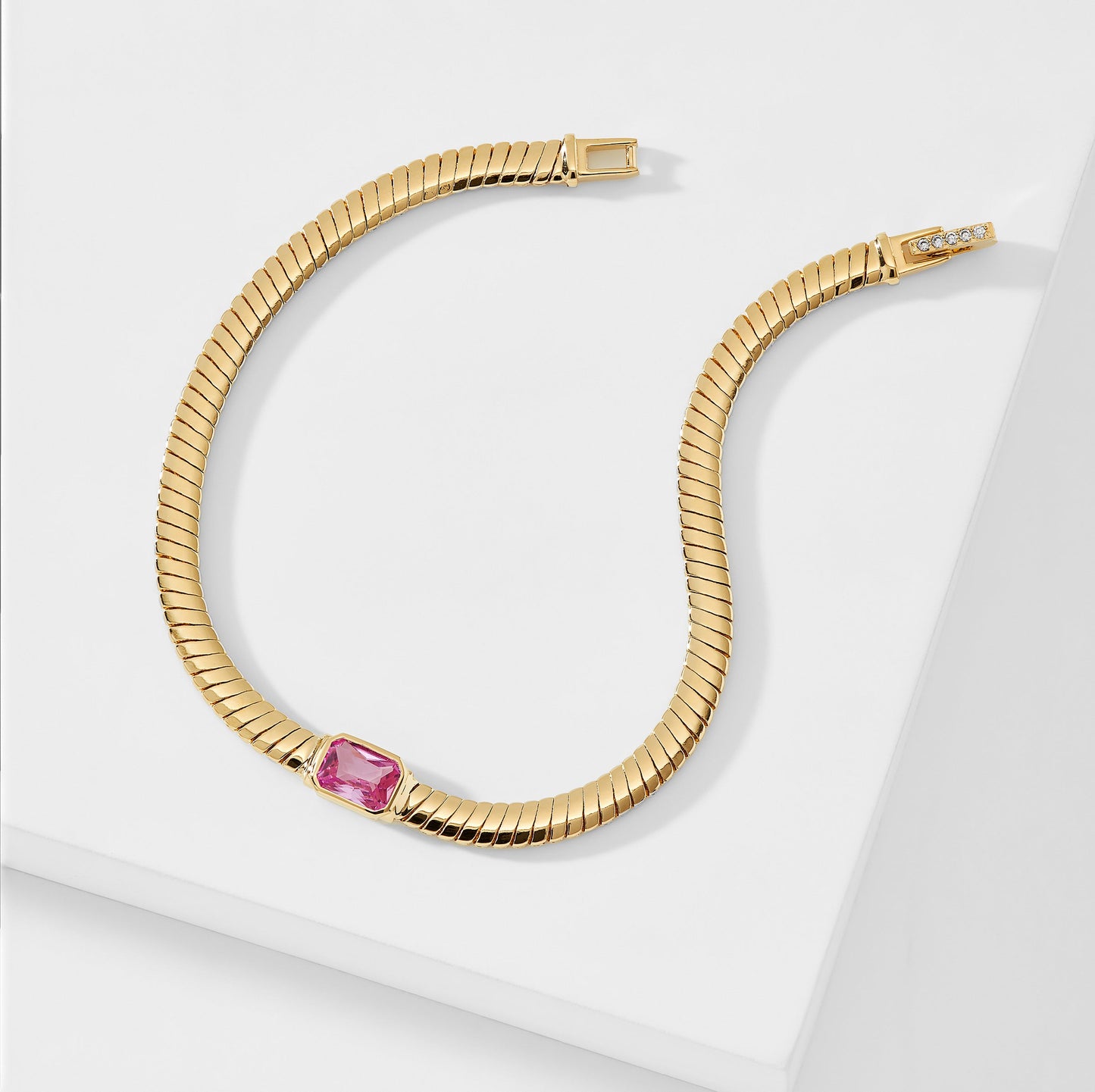 TENNIS ANYONE PINK EMERALD CUT WOVEN CHAIN BRACELET