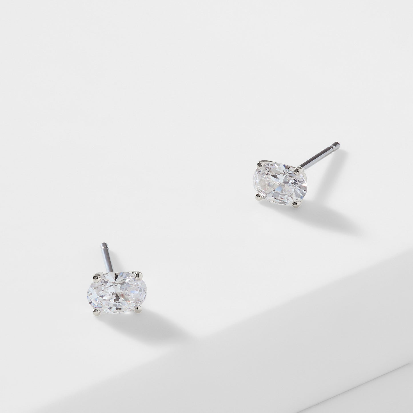 MODERN LOVE OVAL CZ STUD EARRINGS