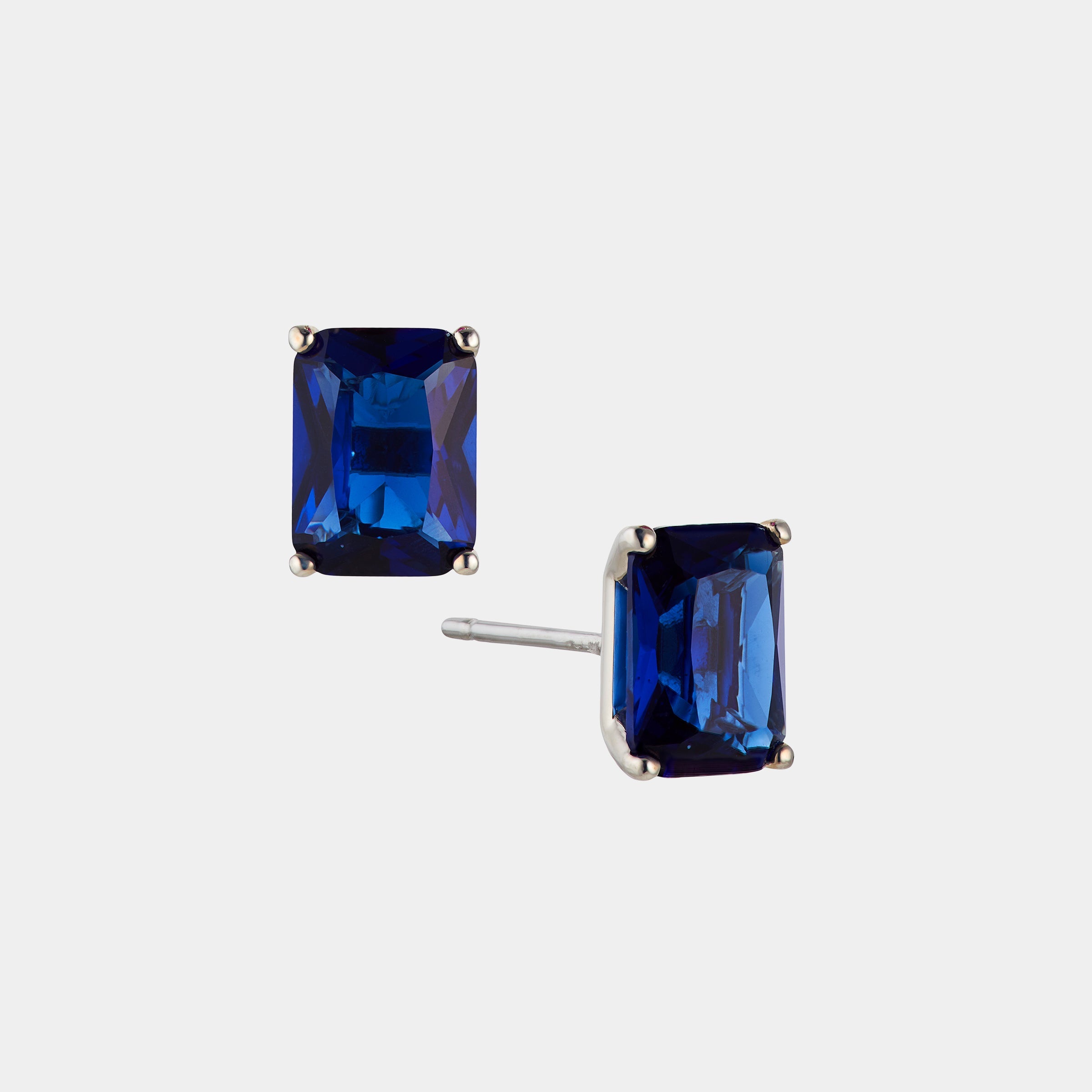 MODERN LOVE LARGE EMERALD CUT FAUX SAPPHIRE STUD EARRINGS – NADRI Wholesale