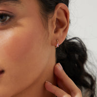 TENNIS ANYONE EMERALD CUT PINK STONE AND PAVE CZ HUGGIE HOOPS