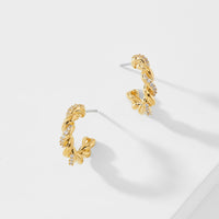 BRUNCH TWISTED PAVE HOOP EARRINGS